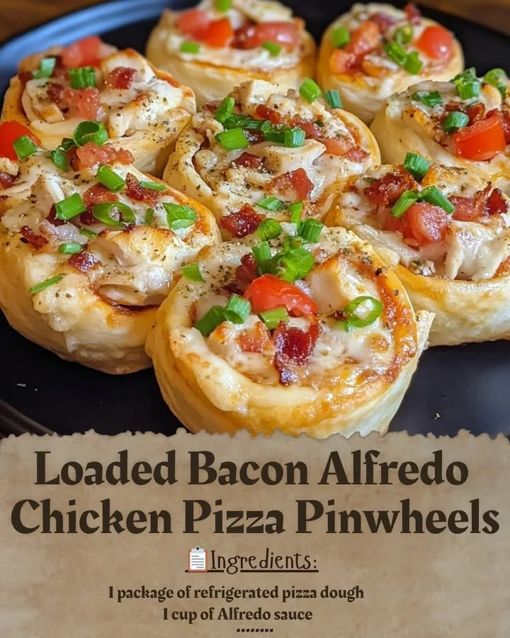 Loaded bacon Alfredo chicken pizza pinwheels served on a plate