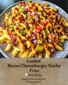 Loaded Bacon Cheeseburger Nacho Fries topped with cheese, bacon, and jalapeños.