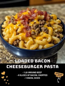 Delicious loaded bacon cheeseburger pasta topped with melted cheese and bacon