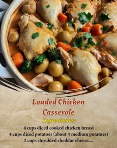 Loaded chicken casserole topped with cheese and vegetables