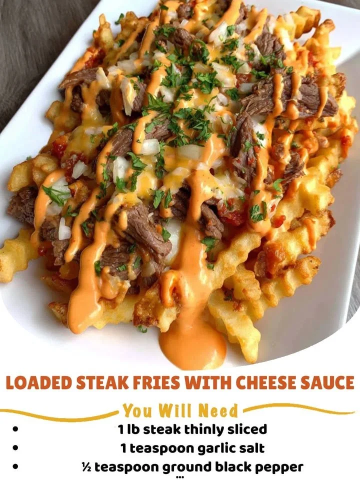 Loaded steak fries topped with cheese sauce and fresh toppings