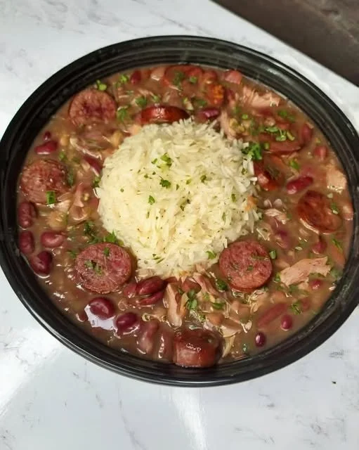Delicious Louisiana Red Beans and Rice with Smoked Sausage served in a bowl