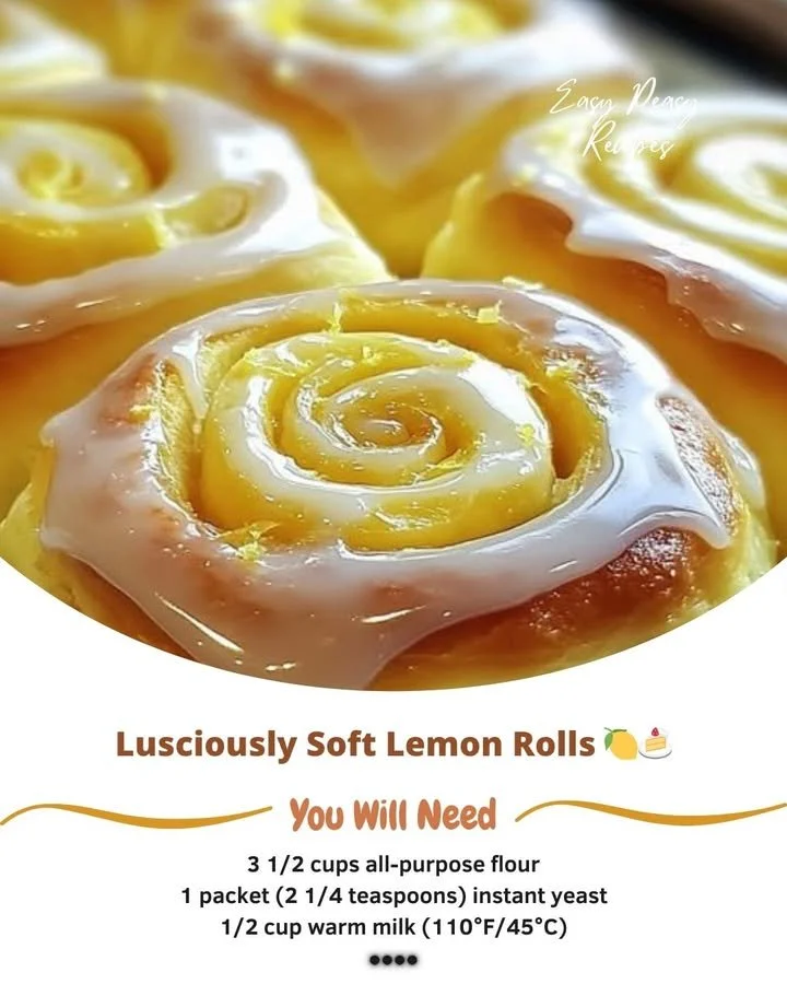 Lusciously soft lemon rolls topped with citrus glaze on a rustic wooden table.