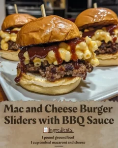 Mac and Cheese Burger Sliders with BBQ Sauce served on a wooden platter