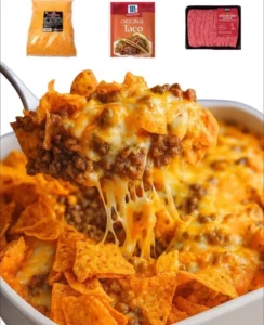 30-Minute Dorito Casserole topped with cheese and tortilla chips