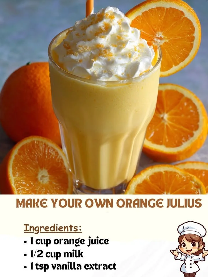 Delicious homemade Orange Julius drink topped with whipped cream