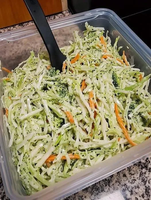 Colorful Mediterranean Garden Slaw with creamy lemon-tahini dressing served in a bowl.