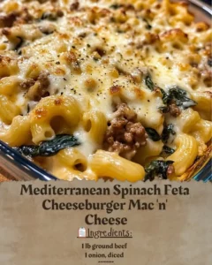 Bowl of Mediterranean Spinach Feta Mac and Cheese topped with herbs