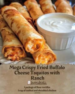 Fried buffalo cheese taquitos served with ranch dressing for dipping