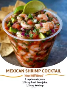 Delicious Mexican shrimp cocktail served in a glass with fresh ingredients.