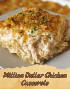 Delicious Million Dollar Chicken Casserole baked with creamy sauce and topped with cheese