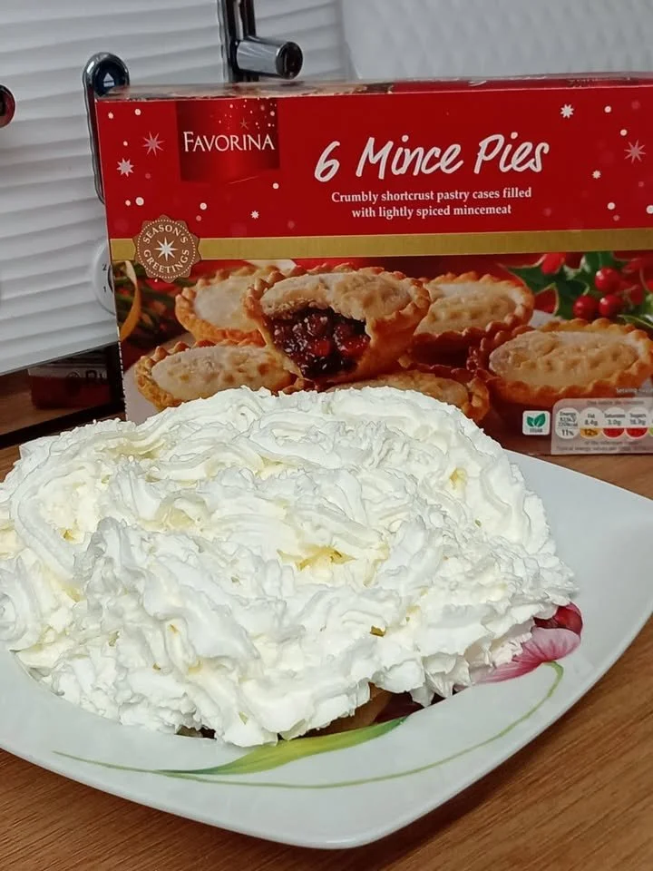 Freshly baked mince pies with a golden crust and rich filling