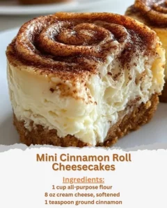 Mini cinnamon roll cheesecakes topped with creamy frosting and cinnamon glaze.