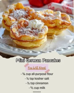 Mini German Pancakes served with syrup and fruit