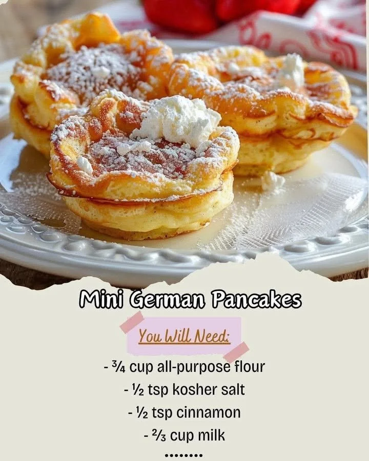 Mini German Pancakes served with syrup and fruit