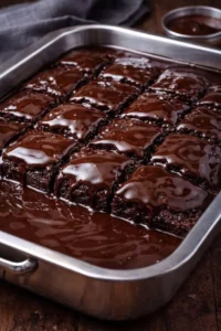 Deliciously moist chocolate cake topped with rich chocolate frosting.