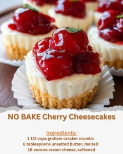 No bake cherry cheesecakes with fresh cherries on top.