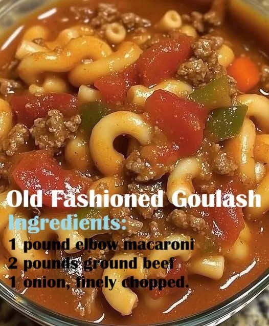 Bowl of Old Fashioned Goulash with pasta and meat, garnished with parsley