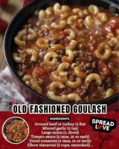 Bowl of Old-Fashioned Goulash topped with fresh herbs and spices