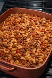 Bowl of Old Fashioned Goulash with noodles and ground beef.