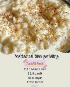 Bowl of creamy old-fashioned rice pudding topped with cinnamon and raisins