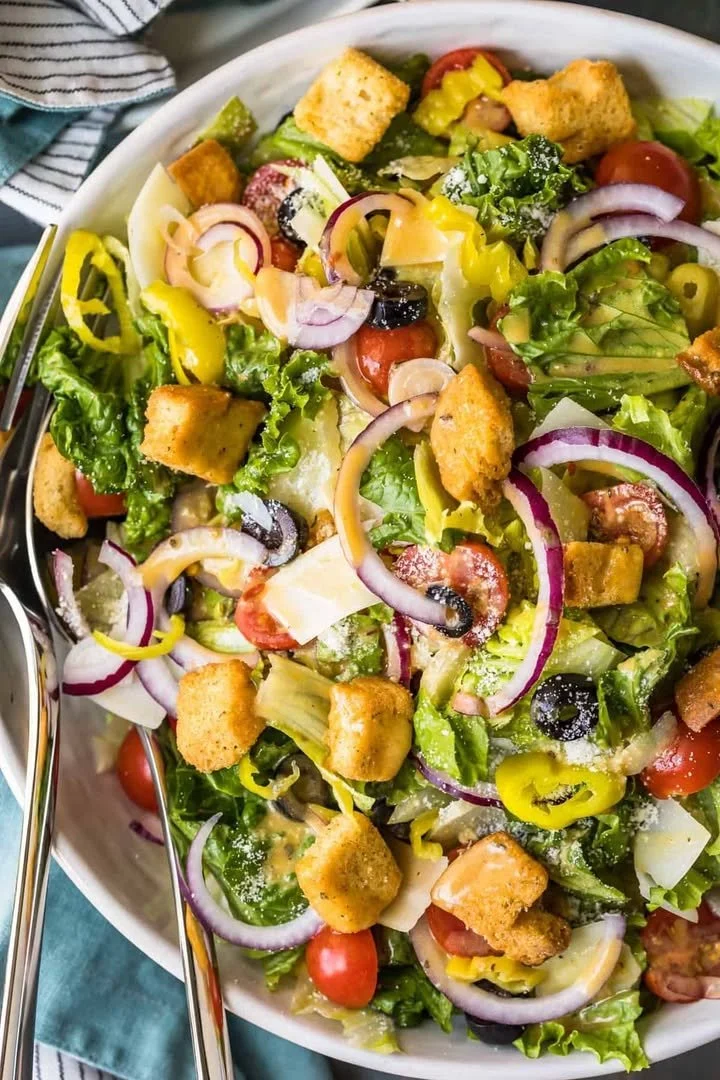 Delicious Olive Garden Salad with copycat dressing on a plate