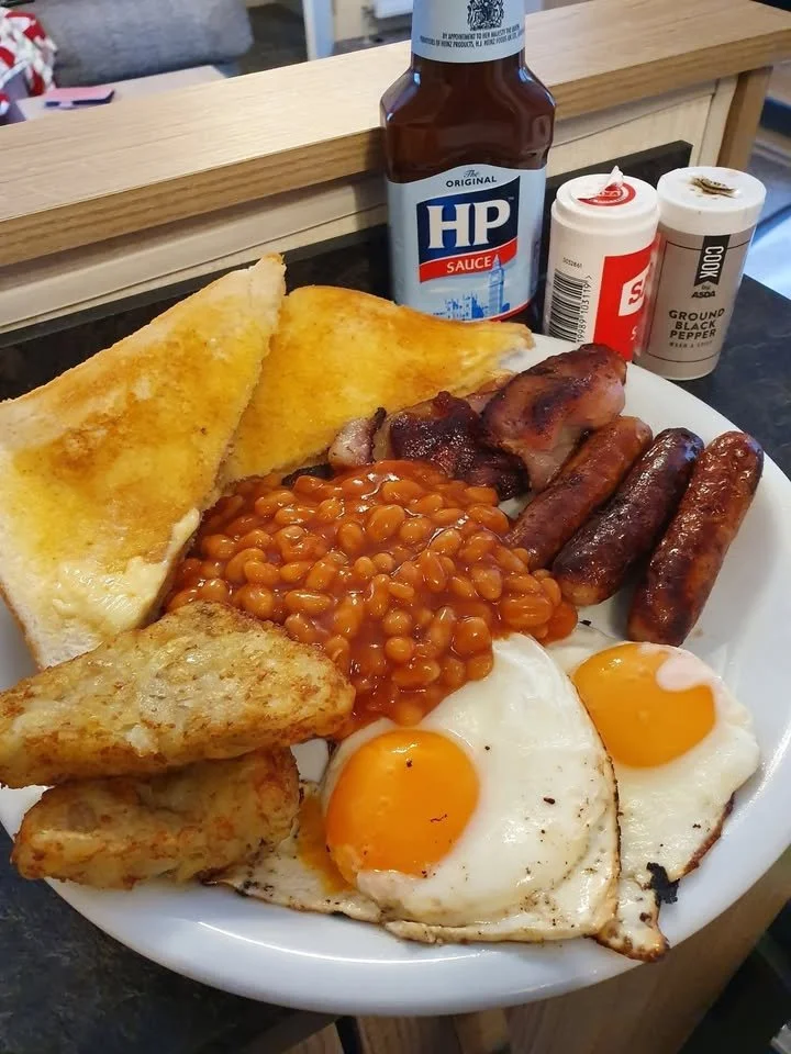 Delicious one pan breakfast featuring eggs, vegetables, and bacon cooked together.