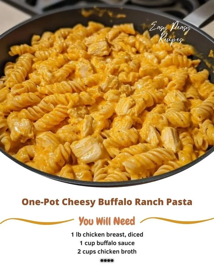 One-pot cheesy buffalo ranch pasta topped with herbs and cheese for a tasty meal.