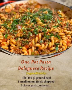 Delicious one-pot Pasta Bolognese with fresh herbs and ingredients.