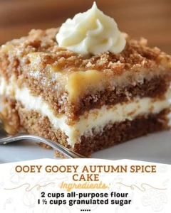 Delicious ooey gooey autumn spice cake with warm spices and a frosted topping.