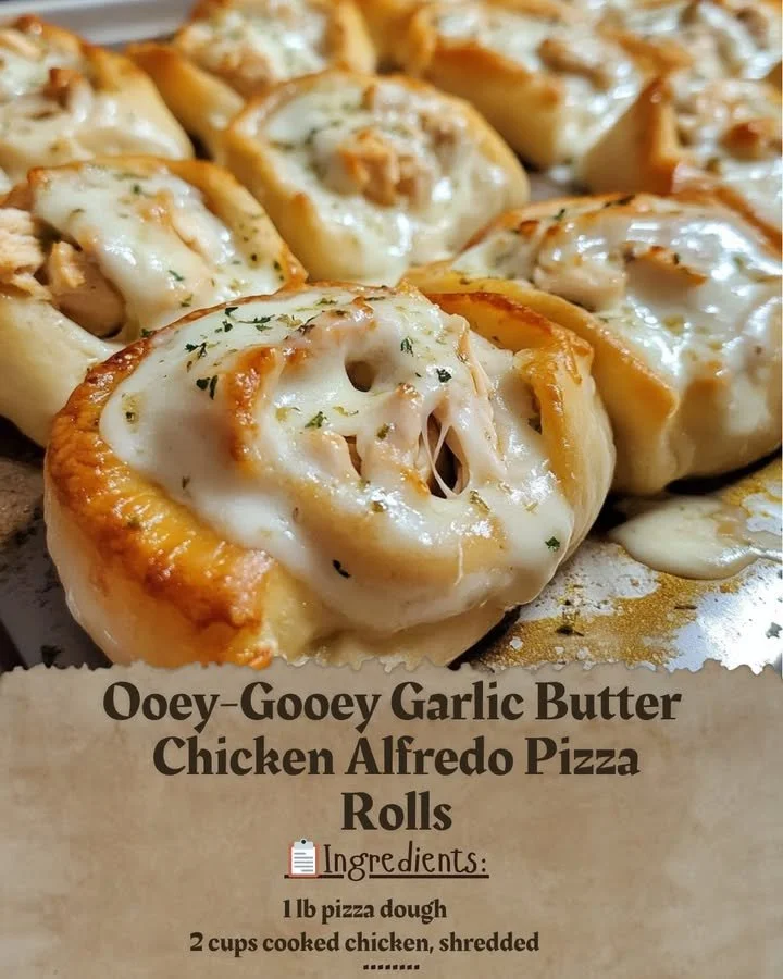 Garlic Butter Chicken Alfredo Pizza Rolls topped with cheese and herbs