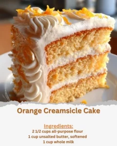 Delicious Orange Creamsicle Cake with orange frosting and creamy layers