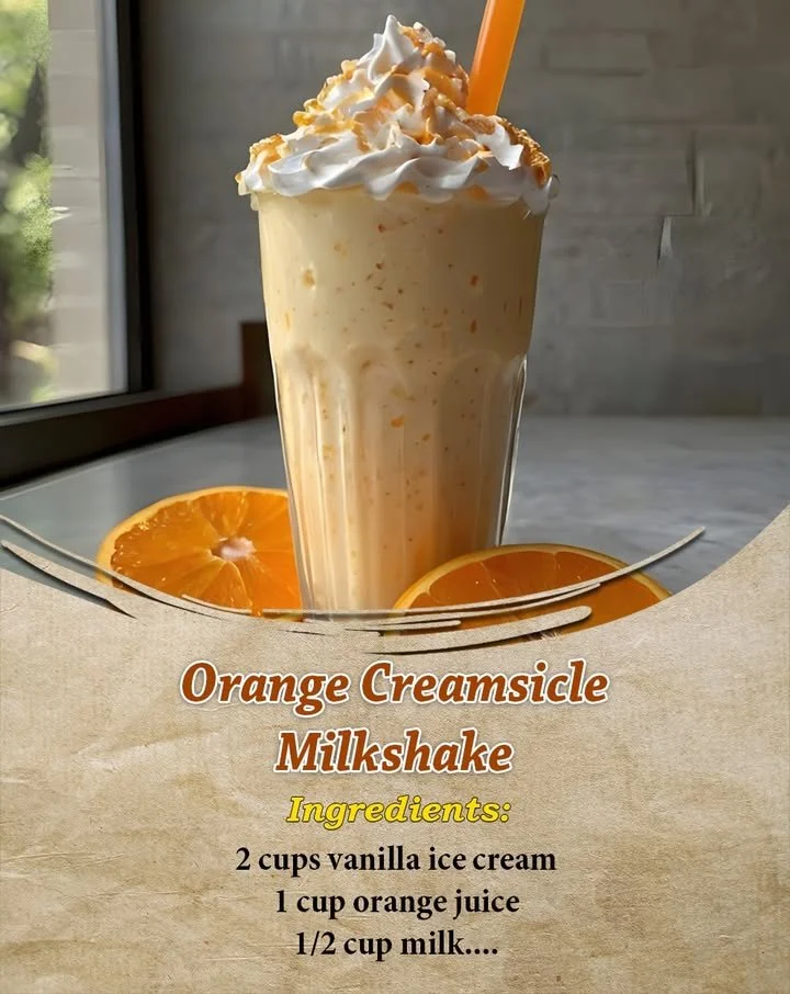 Delicious orange creamsicle milkshake topped with whipped cream