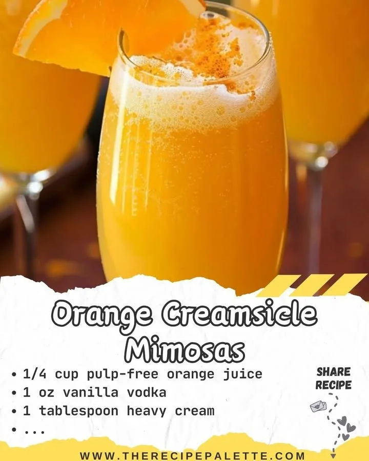 Refreshing orange creamsicle mimosas served in a glass.