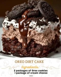 Delicious homemade Oreo Dirt Cake topped with crushed Oreos and chocolate.
