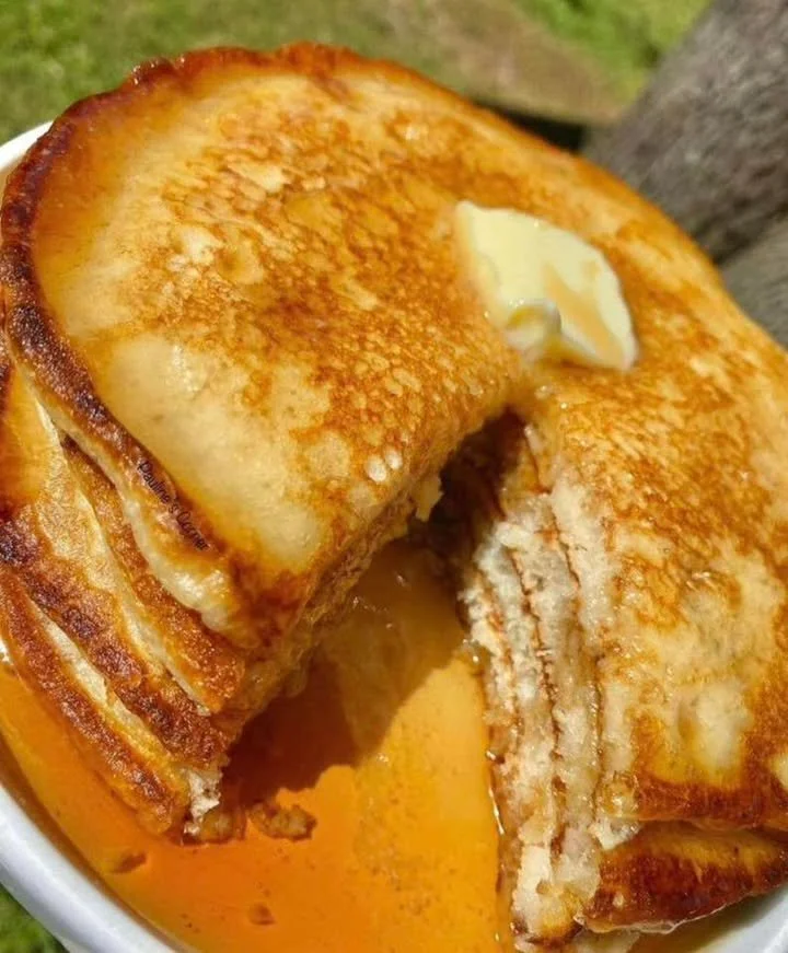 Delicious crispy pancakes with golden edges served on a plate