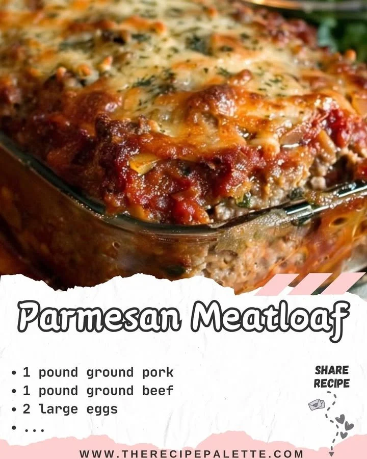 Delicious Parmesan Meatloaf with herbs and cheese on a plate.