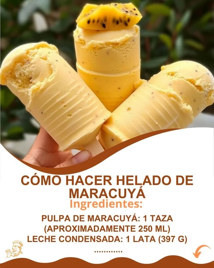 Homemade passionfruit ice cream in a bowl with a scoop on top