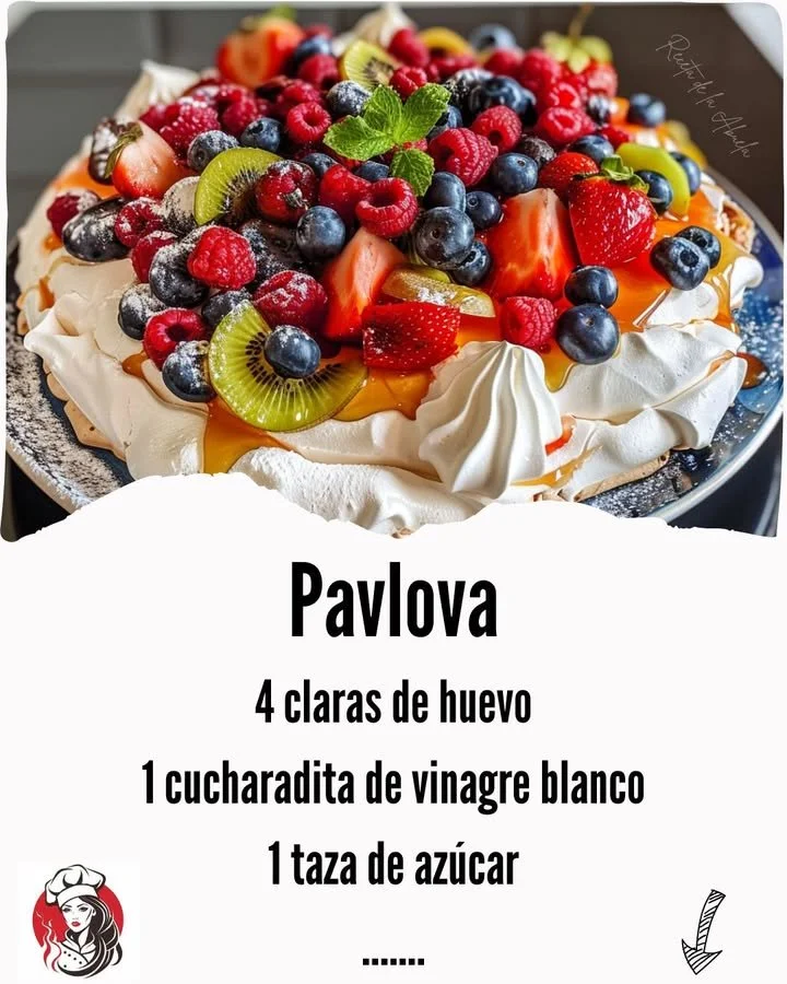 Delicious Pavlova dessert topped with fresh fruits and whipped cream.