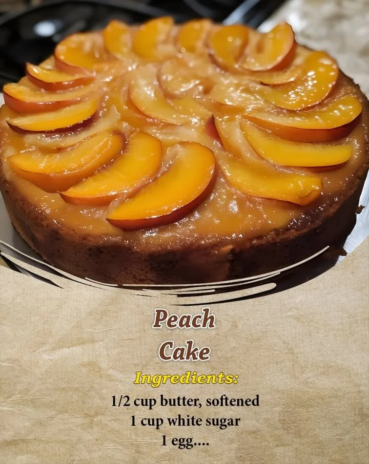 Delicious homemade peach cake with fresh peaches on top