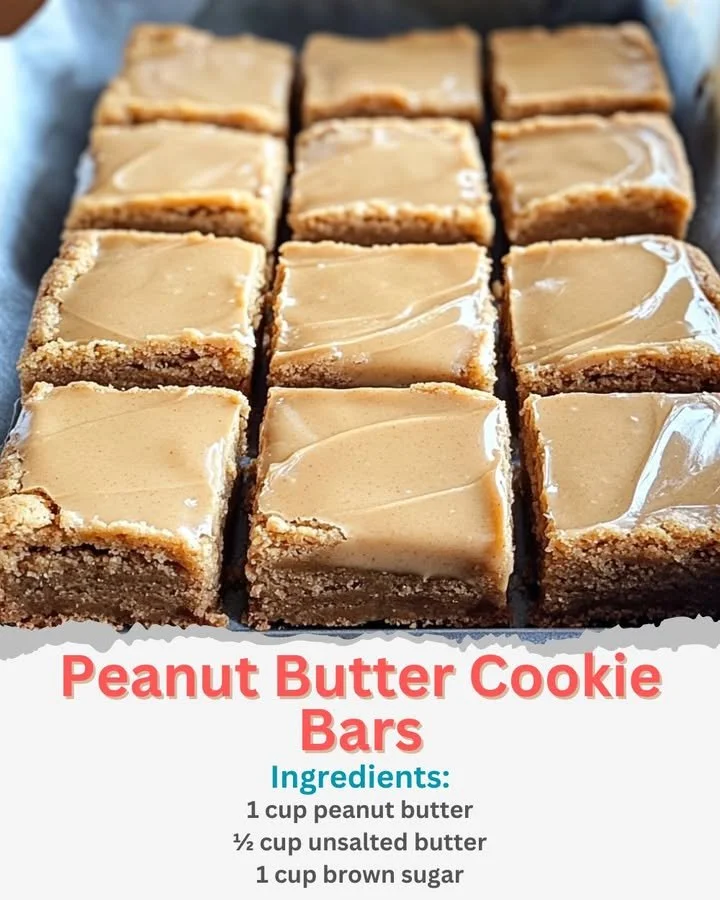 Delicious homemade Peanut Butter Cookie Bars on a white plate.