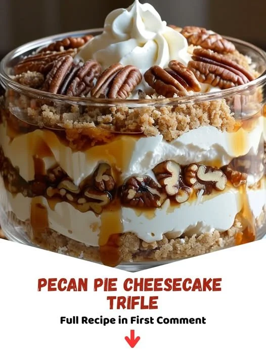Delicious Pecan Pie Cheesecake Trifle topped with pecans and caramel drizzle.