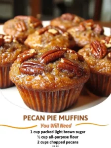 Freshly baked pecan pie muffins topped with nuts and caramel.