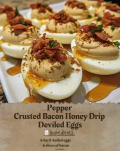Pepper Crusted Bacon Honey Drip Deviled Eggs served on a platter