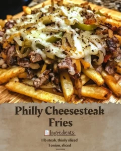 Delicious Philly Cheesesteak Fries topped with melted cheese and steak