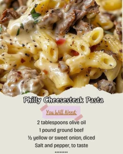 Creamy Philly Cheesesteak pasta dish with steak, peppers, and cheese