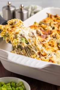 Delicious Philly Cheesesteak Pasta Casserole topped with melted cheese