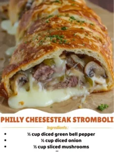 Philly Cheesesteak Stromboli with peppers, onions, and melted cheese