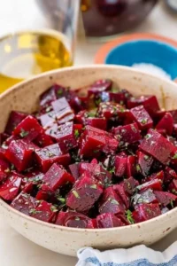 Tasty pickled beetroot bites in a colorful dish for healthy eating.