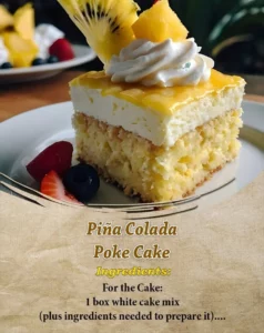 Delicious Pineapple Coconut Poke Cake topped with coconut flakes and pineapple slices